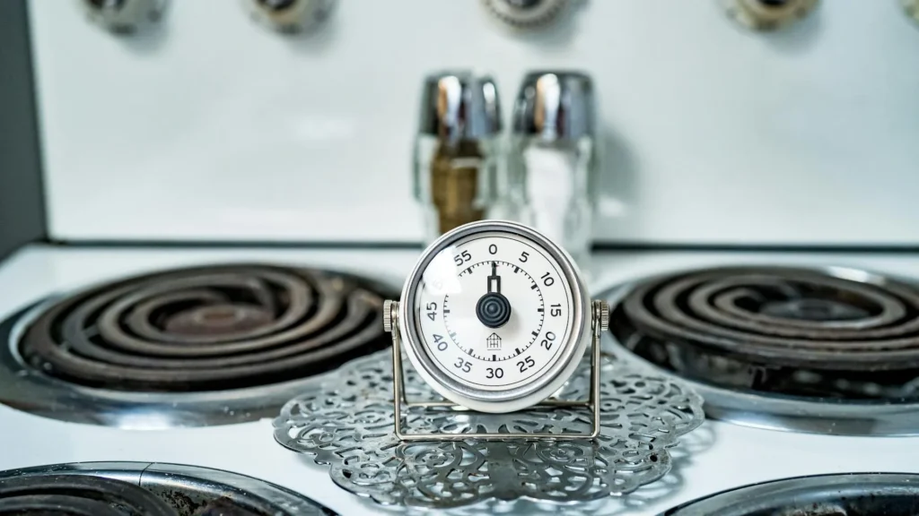 This image contains a kitchen timer showcasing the implied benefits of meal prep